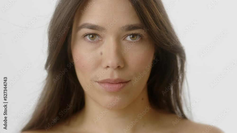 Beauty Woman face Portrait. Beautiful Spa model Girl with Perfect Fresh Clean Skin.Hispanic Female with Brunette hair looking at camera with calm look. Youth and Skin Care Concept. Isolated on a white Beauty Woman face Portrait. Beautiful Spa model Girl with Perfect Fresh Clean Skin.Hispanic Female with Brunette hair looking at camera with calm look. Youth and Skin Care Concept. Isolated on a white