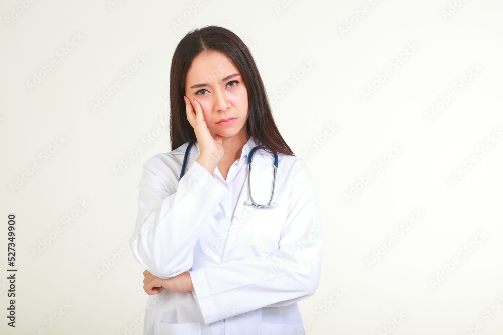 Portrait. Asian female doctor feeling stress from work. on a white background. Health care concept. Portrait. Asian female doctor feeling stress from work. on a white background. Health care concept.