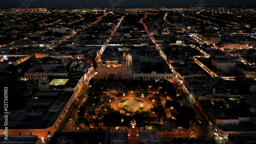 Distant aerial night view of the Plaza Grande and the Cathedral of Merida, Yucatan, Mexico.