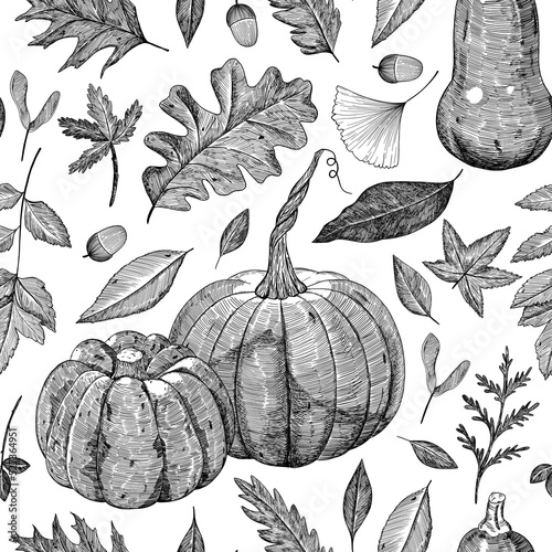 A pattern of autumn leaves and pumpkins. Seamless background. Hand-drawn in the style of engraving