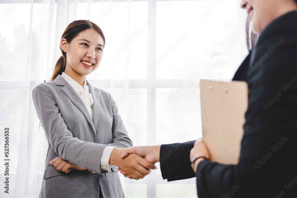 business partner handshake concept Colleagues shaking hands Successful deal after a great meeting. Blurred background. business partner handshake concept Colleagues shaking hands Successful deal after a great meeting. Blurred background.
