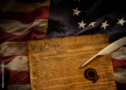 Original 13 star American flag with Declaration of Independence and ink bottle with quill pen