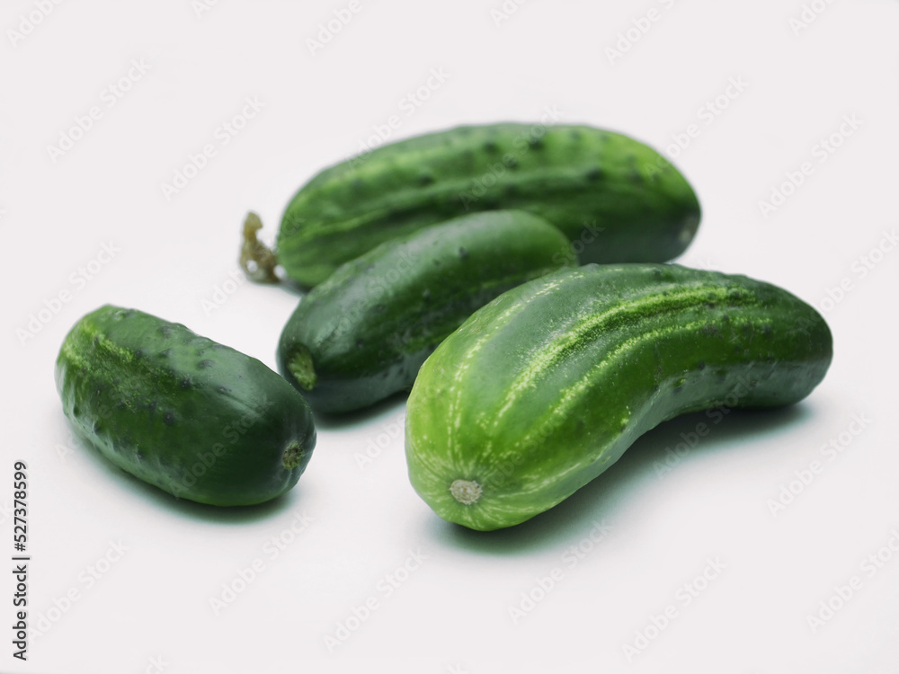 cucumbers on a light background, vegetables cucumbers on a light background, vegetables