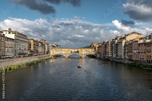 View of Florence with "Ponte Vecchio" in the background and the Arno river