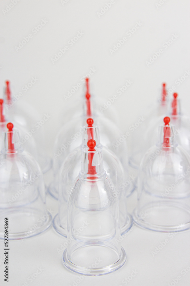 Jars for hijama on a white background. Vacuum jars for hijama. oriental medicine, Arabic healer, anti cellulite therapy, treatment. Jars for hijama on a white background. Vacuum jars for hijama. oriental medicine, Arabic healer, anti cellulite therapy, treatment.