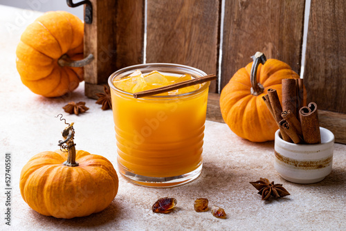 Fall pumpkin spice Old Fashioned cocktail with cinnamon or spiced bourbon smash