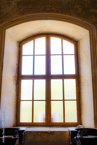 tall window in an old house in central europe