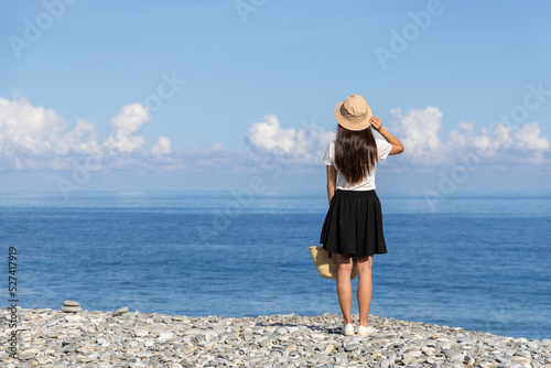 Tourist woman go Manbo stone beach in Hualien photo