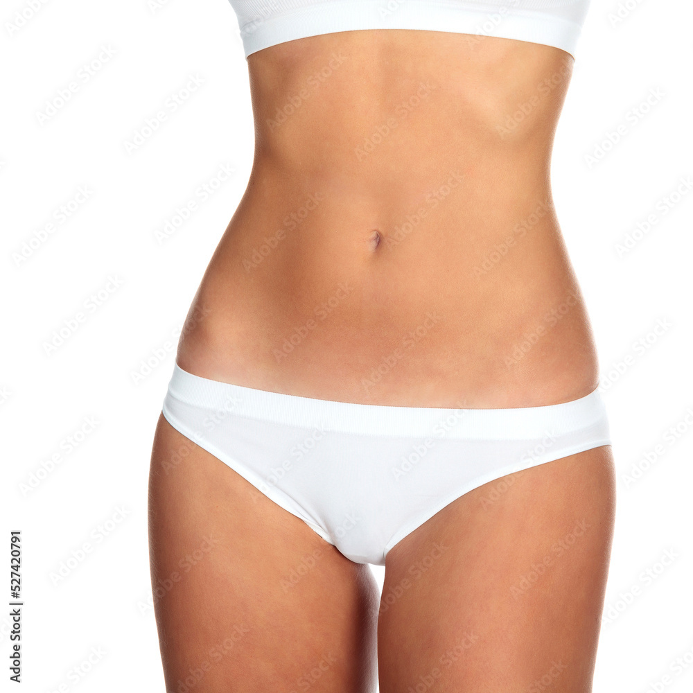 Closeup shot of slim female body against a white background, isolated Closeup shot of slim female body against a white background, isolated