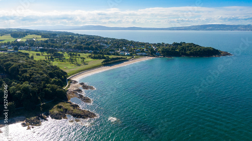 Aerial view on beach and coast of see in Helen's Bay, Northern Ireland. Drone shot sunny day 