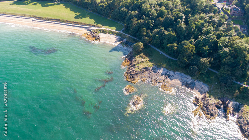 Aerial view on beach and coast of see in Helen's Bay, Northern Ireland. Drone shot sunny day 