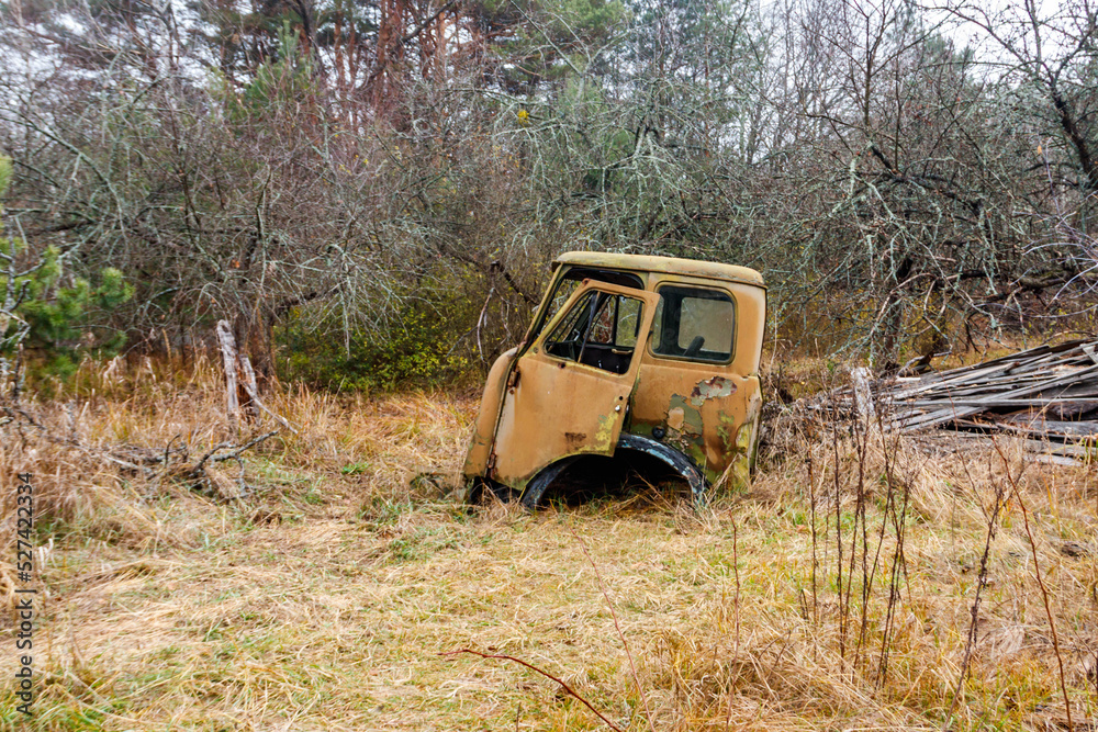 Old rusty abandoned damaged truck in Chernobyl exclusion zone, Ukraine