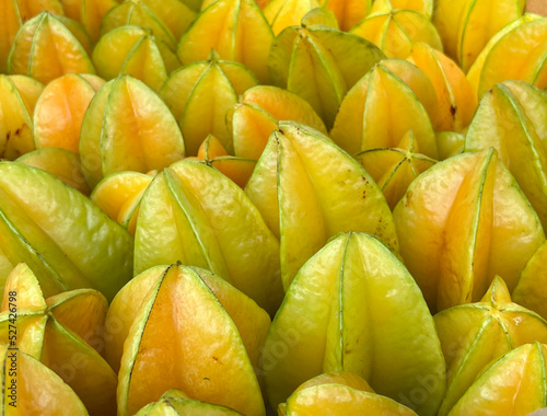 Crate of yellow star fruit (also known as carambola) at a farmers market