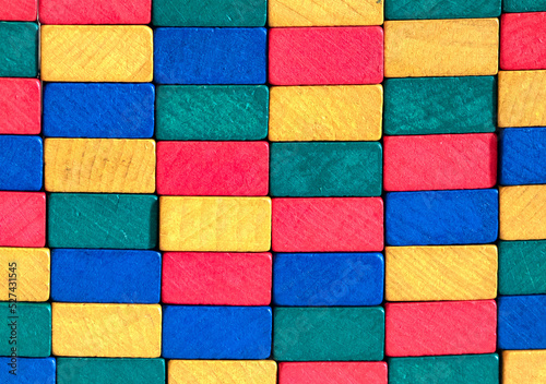 Colorful wooden squares in a row on top of each other