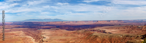 Panoramic view of the vast open red rock spaces of canyons viewed from Canyonlands National Park, UT, USA