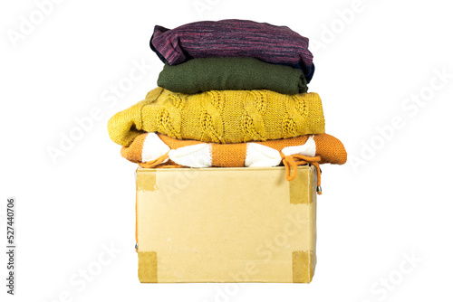 used clothes  in carton box for donation, collection and support of war victims, helping people, charity