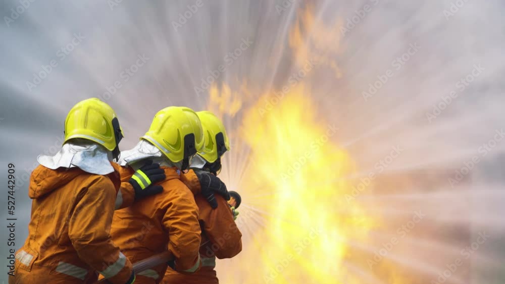 Close up fireman or firefighter team help to extinguish or get rid fire ...