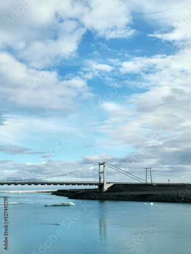 Jökulsárlón bridge over river from gla cier to iceland north sea cold photo