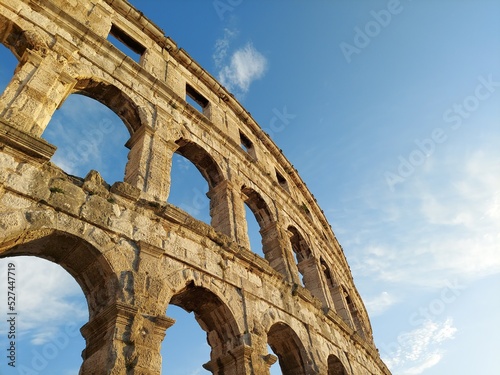 Fotografiet Low Angle View Of Coliseum Against Sky