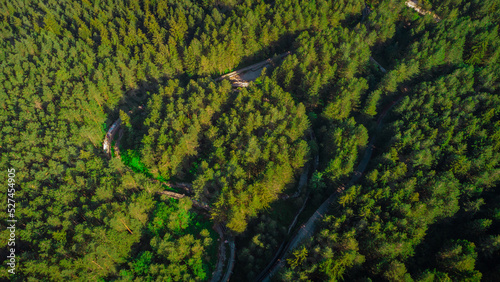 Fotografiet Aerial view of Abandoned or deserted remains of former bobsleigh track in Sarajevo, for the 1984 winter games