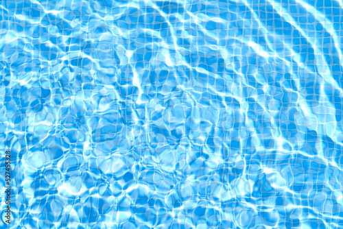 Defocus blurred blue watercolor in swimming pool rippled water