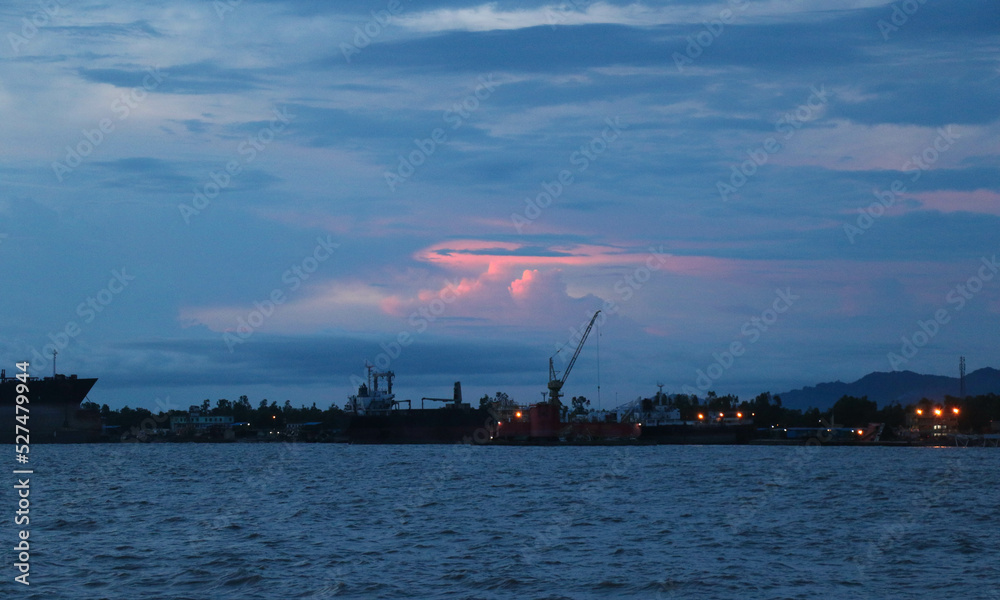 Cargo Shipyard in the Sea in the Evening