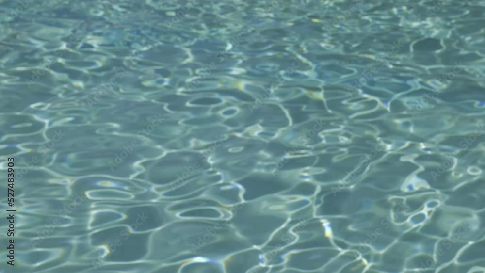 Swimming Pool. Clear Water Background With The Reflection Of Sun