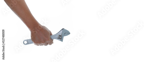 Hand  holding adjustable wrench isolated white background with copy space © dera