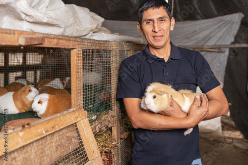 Farmer on a guinea pig farm
