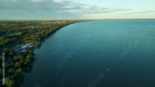 A high up view over lake winnebago in wisconsin during the summer and slow lowering down photo