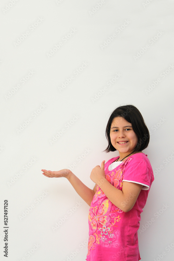 Happy and excited Hispanic 10-year-old girl is amazed at a promotion or discount of something that children like very much
Happy and excited Hispanic 10-year-old girl is amazed at a promotion or discount of something that children like very much