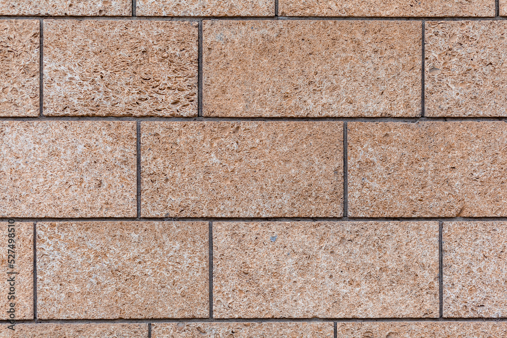 Naklejka premium Texture of a stone wall. Old castle stone wall texture background. Stone wall as a background or texture. Part of a stone wall, for background or texture