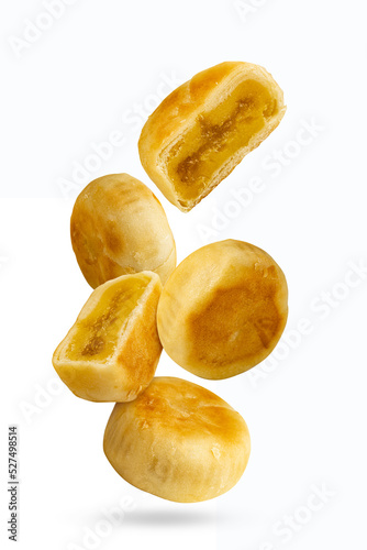 Vietnamese Vegan pia cake (or Banh Pia moon cake, durian cake) isolated on white background