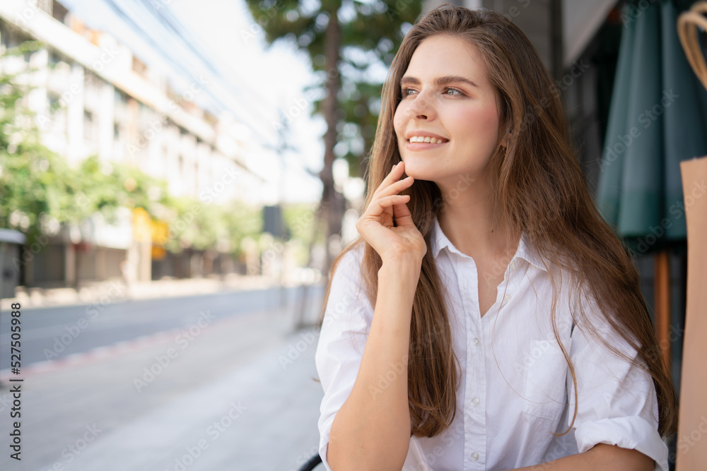 Grocery stores are happy that women go shopping.woman sitting on the street.woman's lifestyle is shopping in the city .