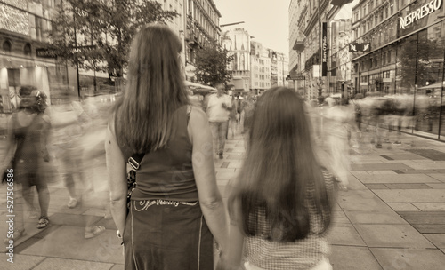 Photography Vienna, Austria - August 19, 2022: Blurred movements of tourists along the city