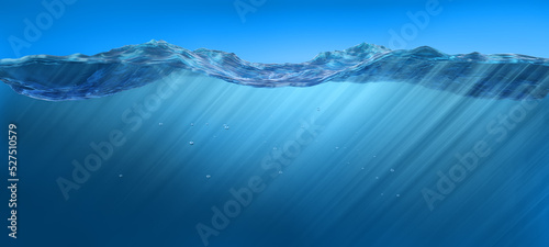 Ocean Water Line with ripples and sunrays underwater