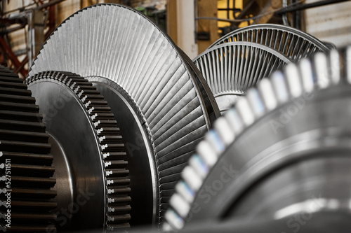 Shiny blades of high-speed steam turbine in workshop © nordroden