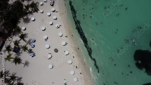 A drone shot of the beautiful Caribbean north beach at Isla Mujeres near Cancun, Mexico. An amazing nature view is seen photo