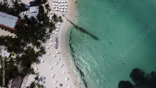 A drone shot of a beautiful north beach with white sand at Isla Mujeres Mexico photo