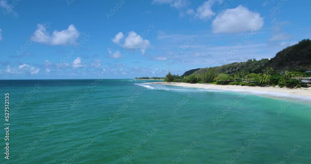 Uncrowded White Sandy Beach And Turquoise Blue Ocean On The Famous North Shore In Oahu, Hawaii In Summer. aerial Uncrowded White Sandy Beach And Turquoise Blue Ocean On The Famous North Shore In Oahu, Hawaii In Summer. aerial