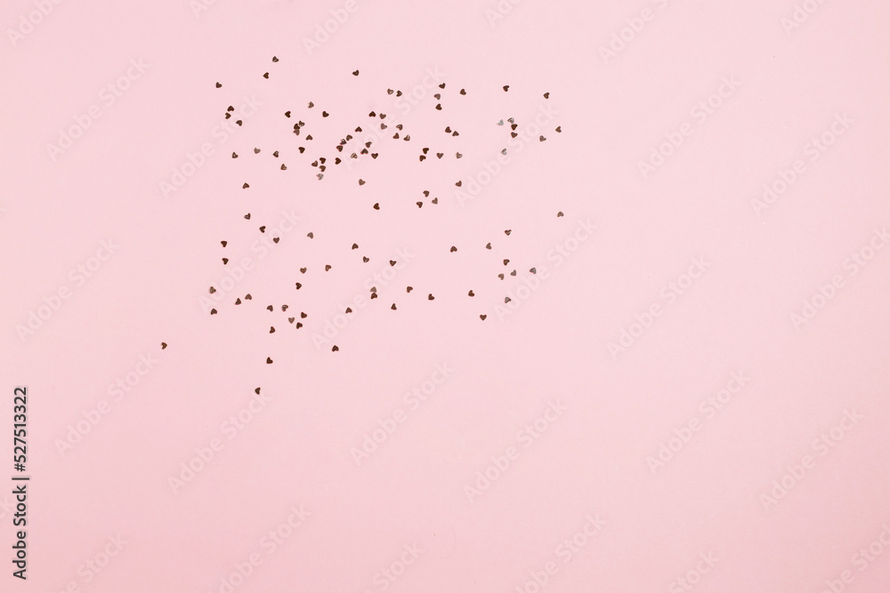 Golden sparkles of heart on a pink background. Stylish banner with space for text Golden sparkles of heart on a pink background. Stylish banner with space for text