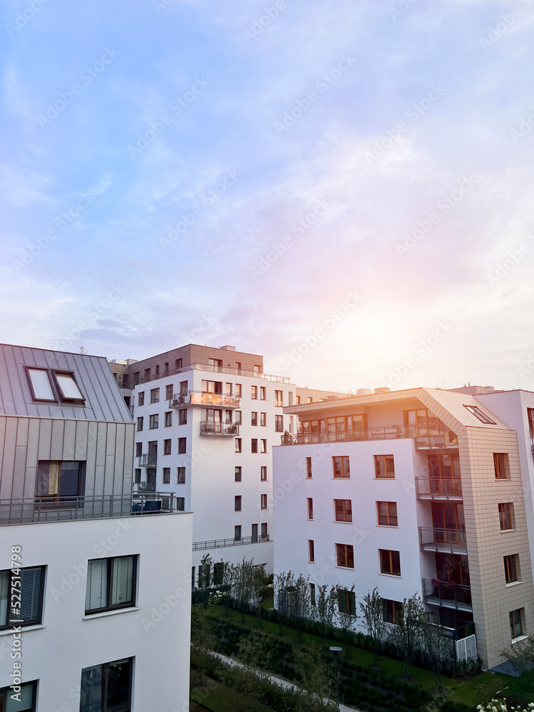 Naklejka premium Exterior of a modern apartment buildings with balcony and white walls.