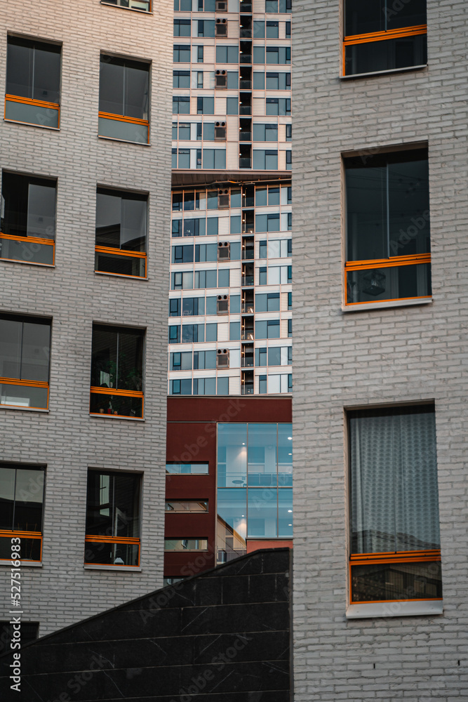 Naklejka premium Layers of building exteriors with many windows