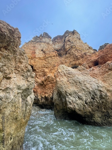 Praia Dona Ana beach Ponta da Piedade with turquoise sea water and cliffs, Portugal. Beautiful Dona Ana Beach (Praia Dona Ana) in Lagos, Algarve, Portugal Sunrise © Sam Foster