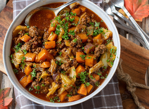Ground beef with cabbage and carrots in bowl
