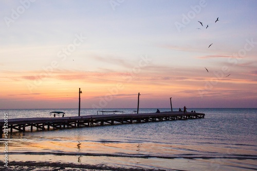 Sunset at Dock in Holbox Island photo