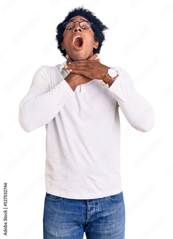 Handsome african american man with afro hair wearing casual clothes and glasses shouting suffocate because painful strangle. health problem. asphyxiate and suicide concept. Handsome african american man with afro hair wearing casual clothes and glasses shouting suffocate because painful strangle. health problem. asphyxiate and suicide concept.