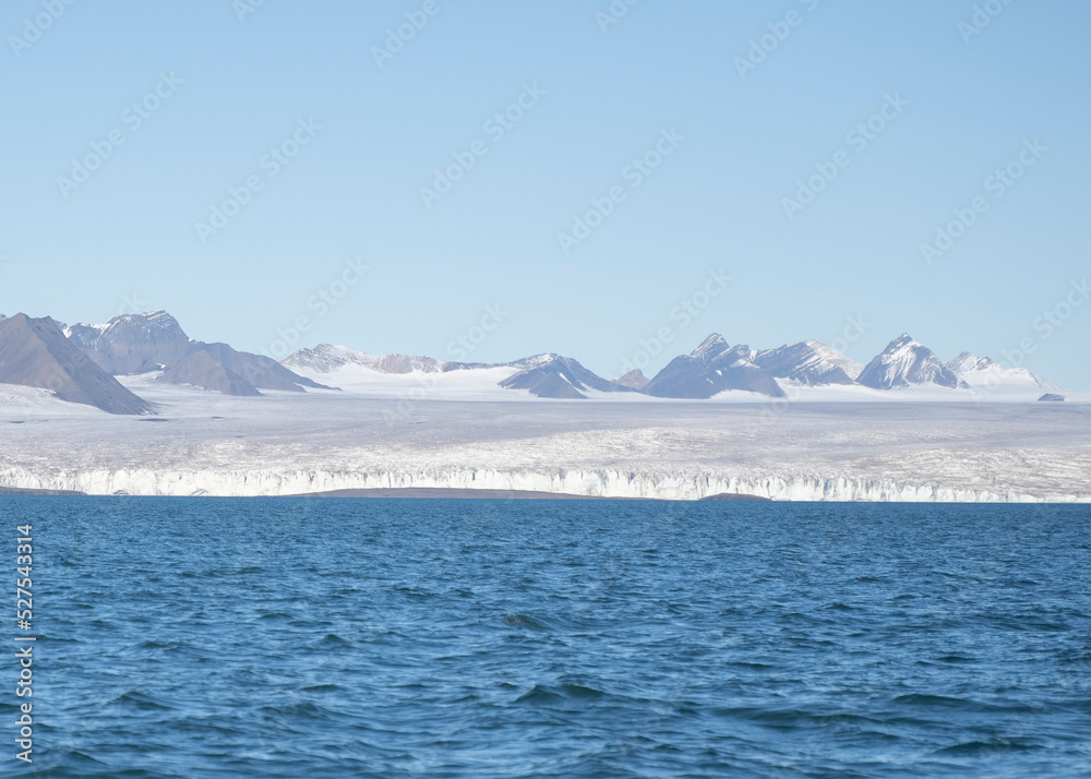 landscape view of an ice glacier in Svalbard islands, in the arctic sea