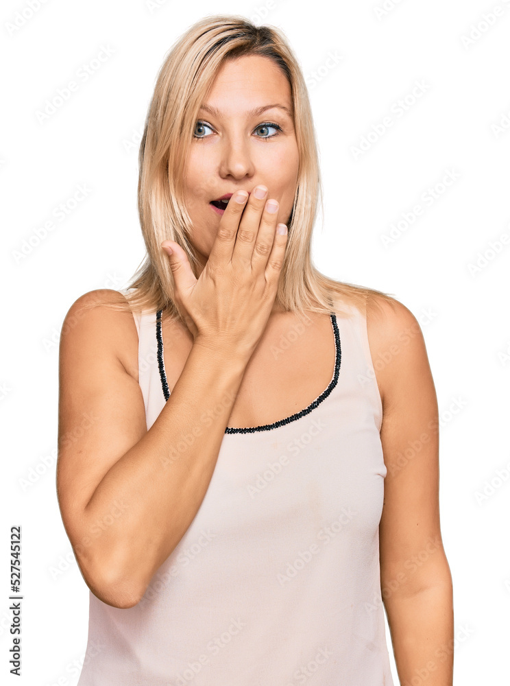 Middle age caucasian woman wearing casual clothes bored yawning tired covering mouth with hand. restless and sleepiness. Middle age caucasian woman wearing casual clothes bored yawning tired covering mouth with hand. restless and sleepiness.