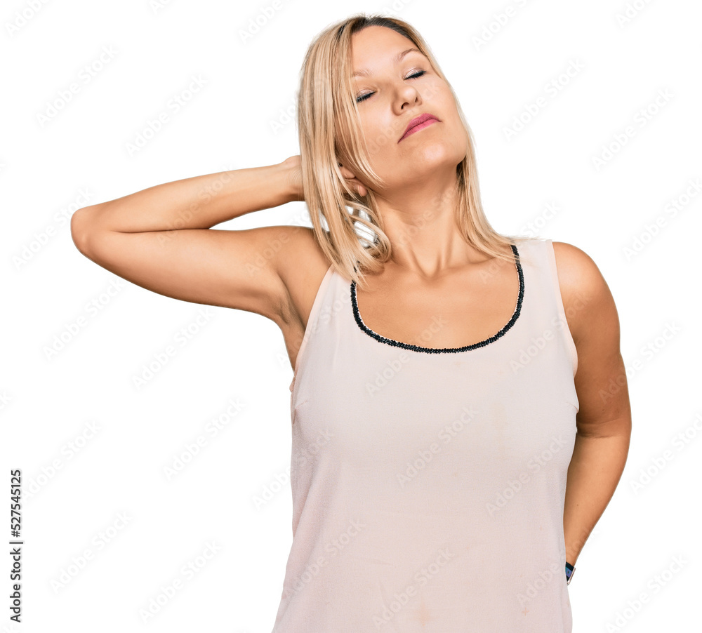 Middle age caucasian woman wearing casual clothes suffering of neck ache injury, touching neck with hand, muscular pain